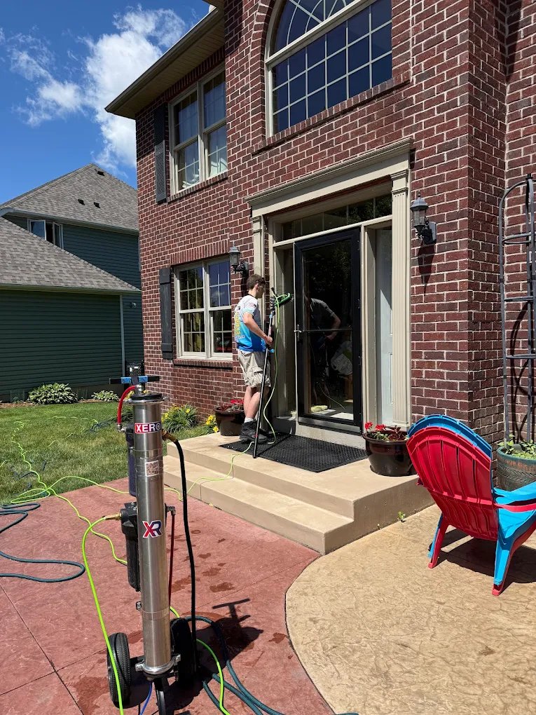 Exterior window cleaning with water-fed pole in Lakeville Minnesota